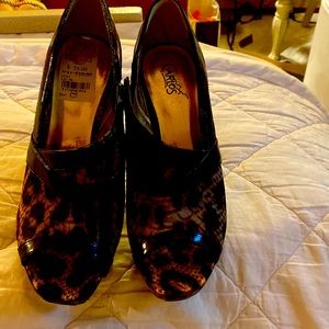 Animal print shoe booties with side zipper.